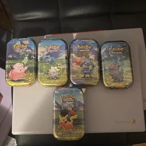 ascended heroes mini tin