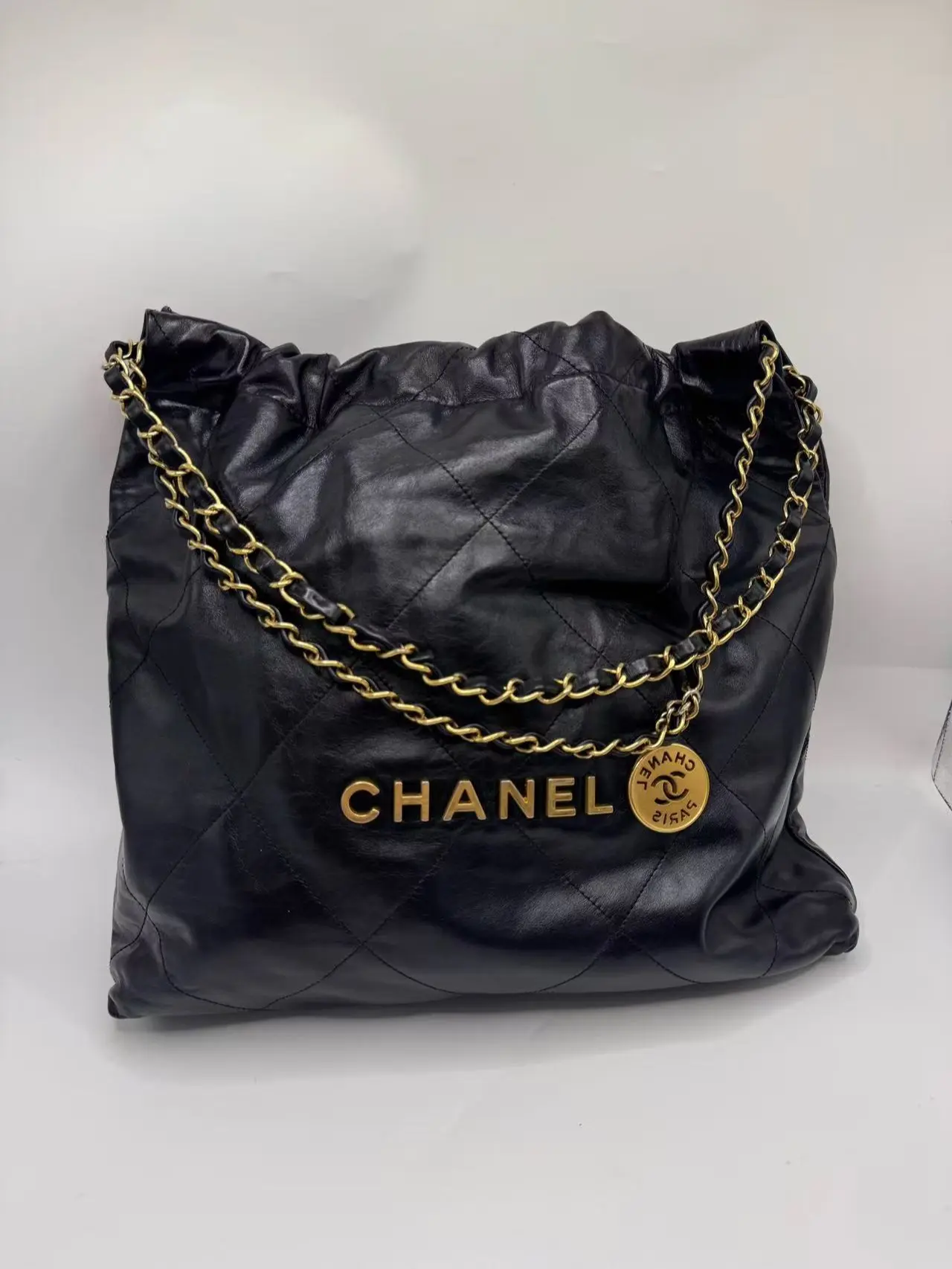Pre-owned CHANEL Black 22 Bag with Gold Hardware, Chip Version, Waxed Calfskin Leather, 99% Like New Condition. Size: 36 × 42 × 8 cm.
