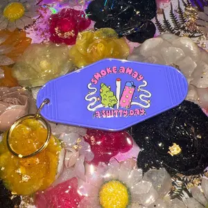 Smoke away motel key chain purple