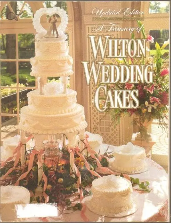 Used Softcover - A Treasury of Wilton Wedding Cakes (Updated Edition) by Wilton Enterprises, Including Wedding Cake Ideas, 0.7 lbs