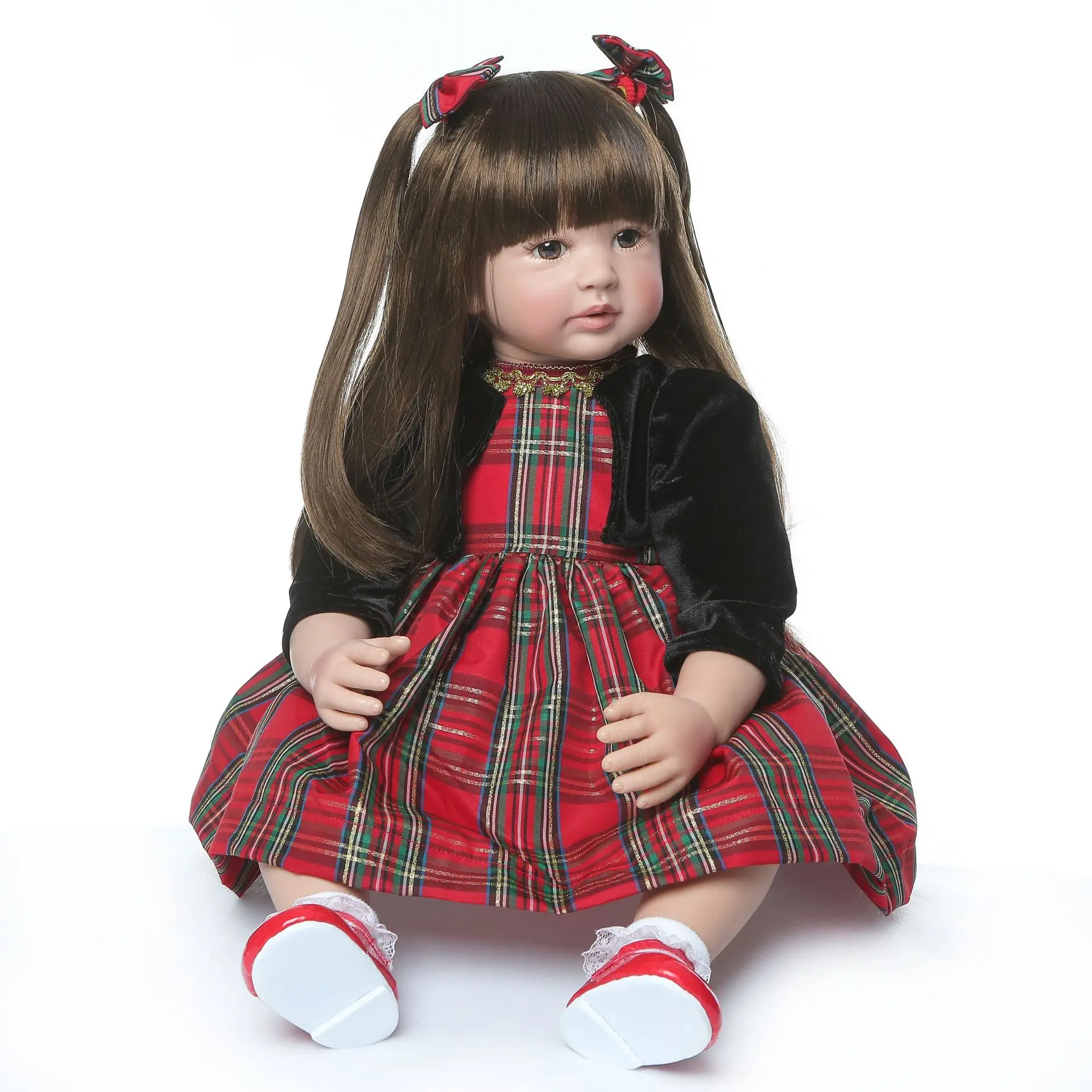 55cm 22 inch reincarnated doll. The head and limbs are made of vinyl material. The limbs of a doll are movable. The doll has a pair of brown eyes and realistic curled eyelashes. Brown hair