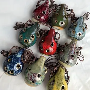 A Six-Hole Ceramic Ocarina - Vintage Style Six-Hole Mini Ocarina, Portable Mini Wind Instrument with Adjustable Lanyard, Available in Purple/Red/Green/Blue/Yellow, Ideal for Music Lovers and Beginners