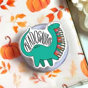 Funny Reading Dinosaur Magsafe Phone Grip – Bookish Magnetic Pop Socket Stand – Cute Gift for Book Lovers