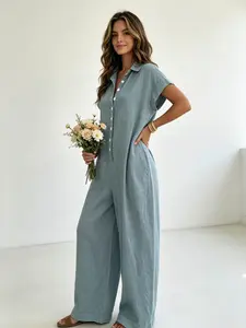 A lady's fashion French lazy-fit Casual Womenswear jumpsuit with a loose button-up design, featuring slimming wide-leg style. Perfect for summer, suitable for light social occasions, afternoon tea, vacation trips, commuting, and at-home wear.