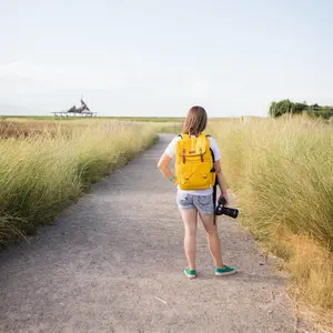 Durable Yellow Camera Backpack, Water-Resistant, Multi-Pocket for Photographers, Lightweight Travel Camera Bag