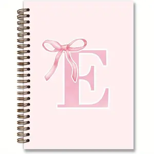 A 5.5*8.3-inch fashionable college-style pink bow spiral notebook with custom initials, a personalized gift diary for ladies, a gift with lettering print for women, a hardcover lined spiral notebook for college use.