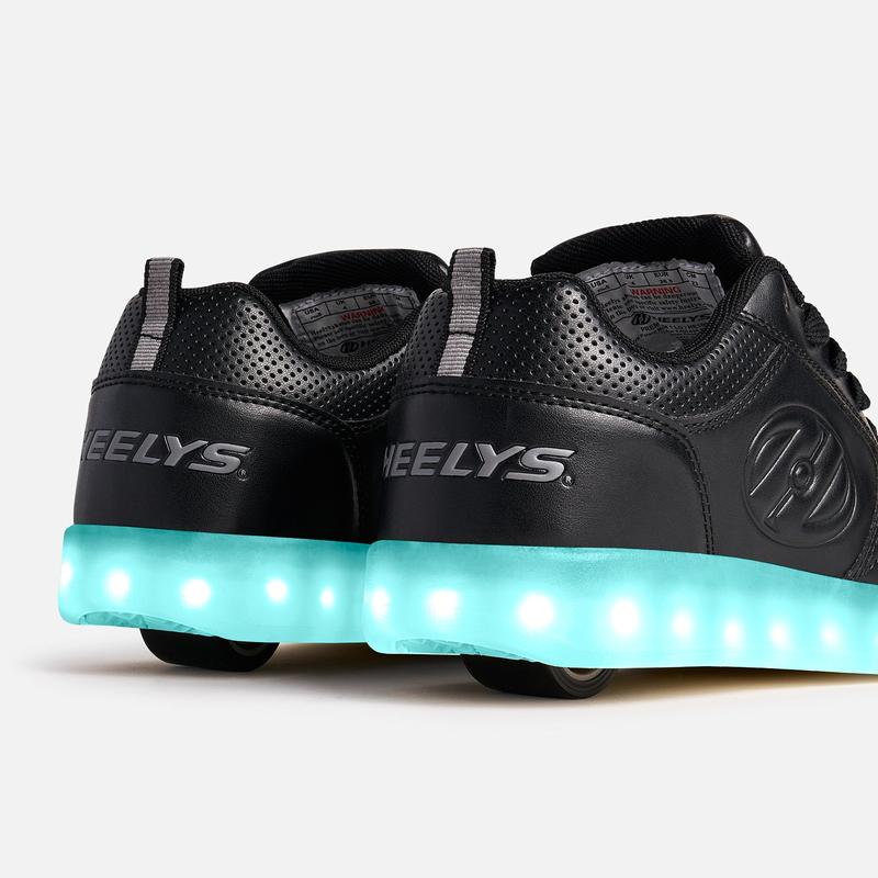 Light UP Heelys Shoes with Wheels! All Black Premium 1 Lo Heelys have lights on the bottom. Recharable with on and off button
