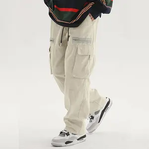 Men's light khaki work pants, street fashion brand style with multiple pockets, eye-catching design, straight loose fit for comfort and a flattering look on all body types, trendy versatile casual pants for autumn. fathersdaygift
