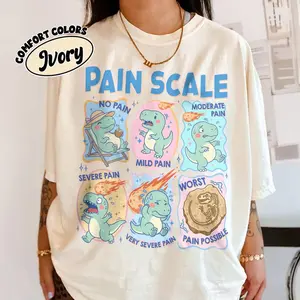 Comfort Colors Dinosaur Pain Scale Shirt Funny Nurse T-Shirt Aesthetic Medical Humor Graphic Tee Vintage Pediatric Nurse Top Cute Dino Nursing Gift Spirit Era Art