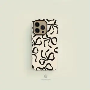 A Black Bow Cream-Colored Phone Case, Compatible with Iphone 11, 12, 13, 14, 15, 16, 17 Pro Max And Pro Plus Series - a Stylish And Creatively Designed New Phone