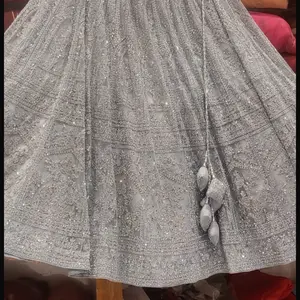 with this stunning Indian party wear lehenga, crafted with exquisite handwork and detailed embroidery. The elegant blend of silver and lavender hues gives it a regal charm, perfect for weddings, receptions, and festive occasions. 	•	Size: Medium to Large