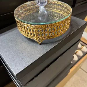 Glass Jewelery Holder with Elegant Gold Rim and Clear Glass Center for Stylish Storage