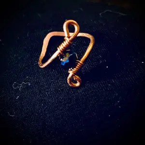 Hammered natural copper with glass crystal bees in a dark blue hue