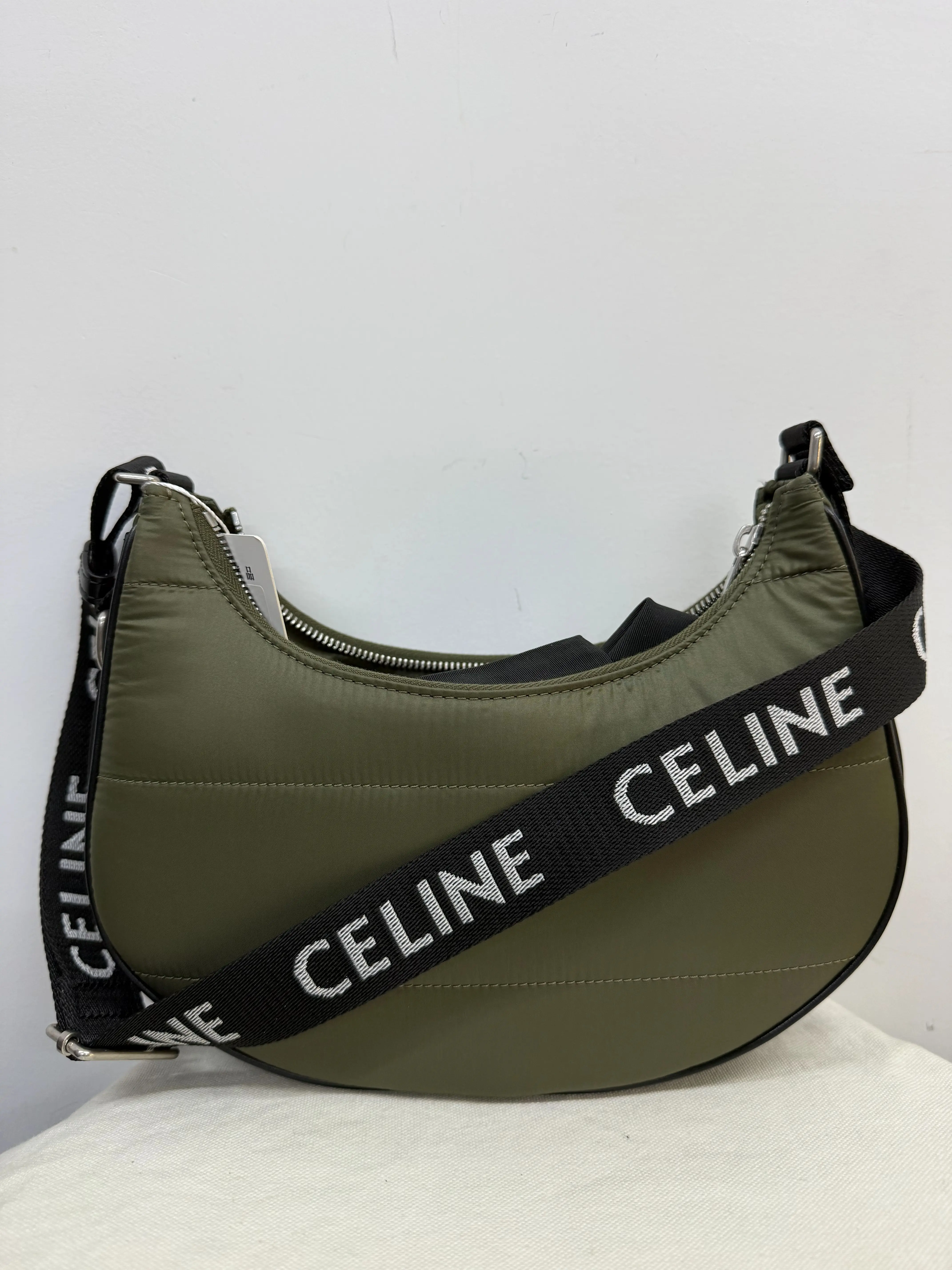Pre-owned Celine Medium Ava Hobo Bag in Khaki Green Nylon with Black Logo Webbing Strap (2021 Production Code, Style Code: B2511020)