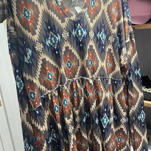 Aztec Hooded Plus Size Boutique Top with Vibrant Geometric Patterns and Comfortable Fit