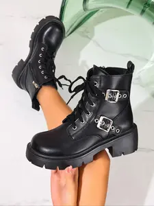 Women's lace-up combat boots, stylish and comfortable footwear suitable for outdoor activities and daily casual wear. They are fashionable accessories, perfect for streetwear and punk styles, featuring stable heels and ideal for petite individuals. Rubber