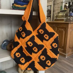 Kitty Bag O/B - Black and orange Patterned Bag as shown in the Image