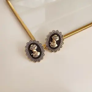 Vintage Women's Earrings with Decorative Design and Gold Finish Elegant Cameo Style Jewelry for Any Occasion