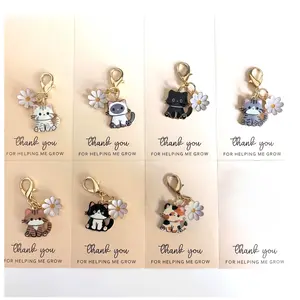 Set of 7 Pocket Hug Employee Appreciation Gifts. Adorable resin cat & daisy keychain charms + meaningful "Thank You for Helping Me Grow" note cards.  Exquisite, durable bulk favors for coworkers, staff & team — sweet mini tokens of gratitude!
