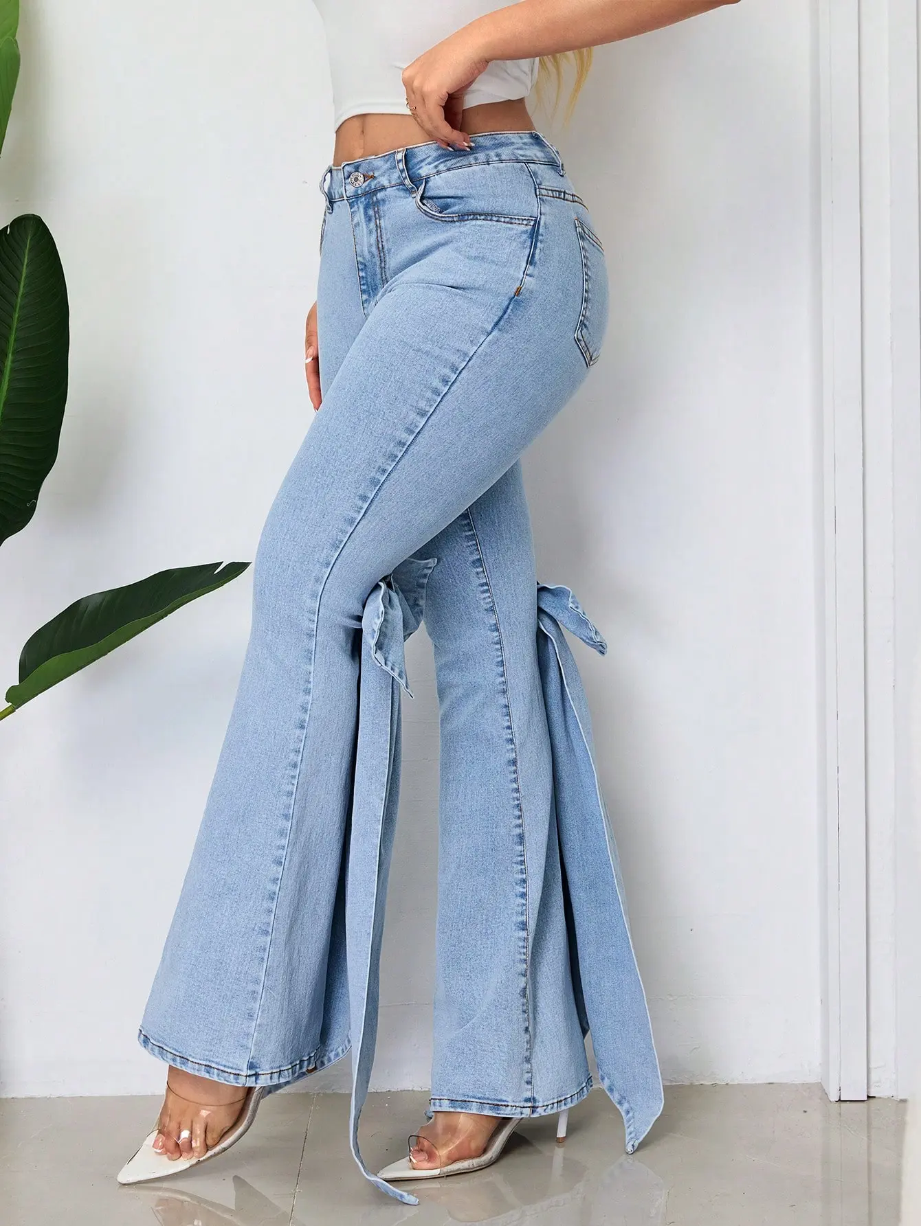 Women's Mid-Waist Washed Flare Jeans With Large Bow Ribbon Details