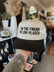 I'm The Friend In Low Places Trucker Hat - Casual Style with Bold Text Design