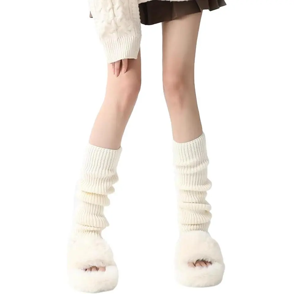 Experience the comfort and versatility of these flared and loose-fitting leg warmers, perfect for layering over tights or socks or wearing on their own