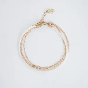 Elegant Gold and White Beaded Layered Bracelet.Handmade Jewelry, Fashion Accessory, Gift for your love one.