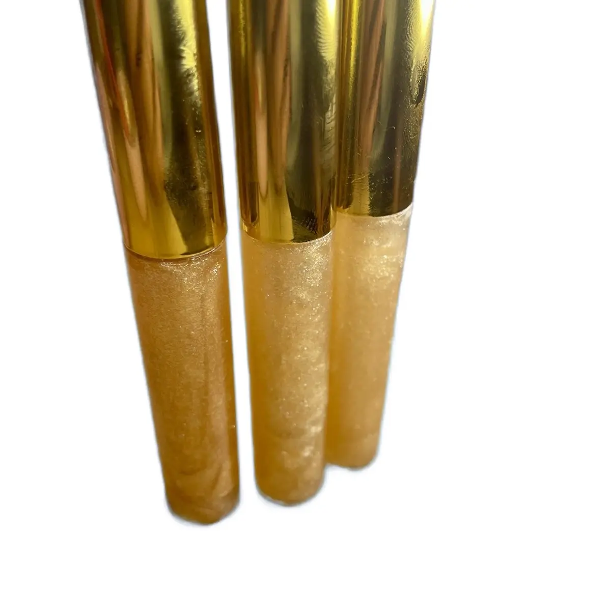 lipgloss in the shade 24k by Moirai cosmetics