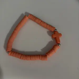 Orange cross bracelet