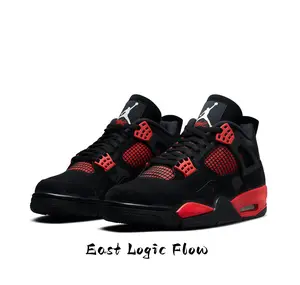 Obsessed with this bold black mid-top sneaker with fiery red accents, perfect for sporty fits and streetwear