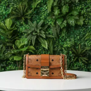 Pre-owned MCM Canvas and leather Crossbody Bags Cognac Gretl Visetos Monogram Mini Crossbody Bag