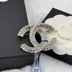 Pre-owned Chanel Silver Radiant with Emerald Cut Strass Brooch GIA1002