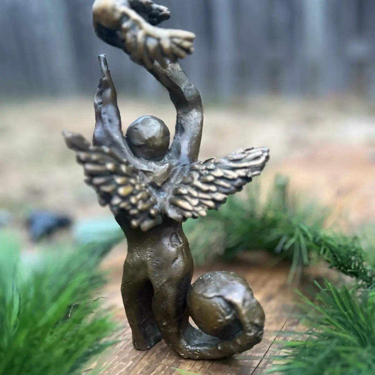 Letting Go Decor Sculpture Bronze Shiny