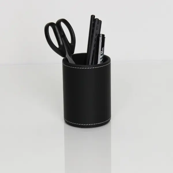 Sleek black leather cylindrical desk caddy brings elegant minimalist decor to workstations. Deep inner cavity holds various stationery tools without clutter for home and office use.