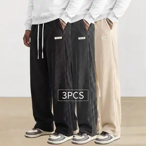 3-pack American vintage corduroy straight-leg men’s pants—trendy, versatile brown casual long pants with a drawstring waist and loose fit; minimalist, stylish men’s bottoms suitable for everyday wear and sports.