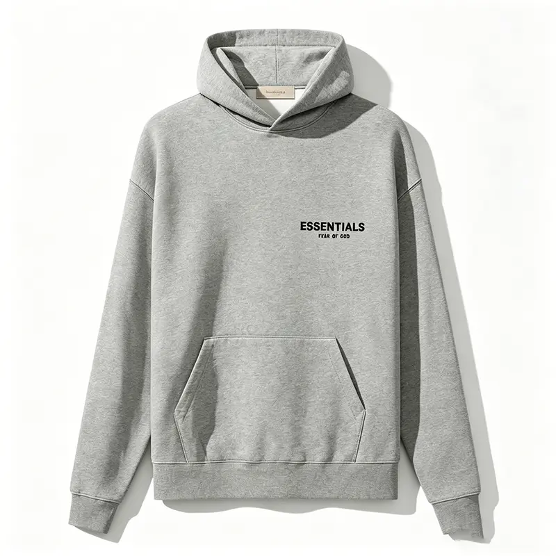 Fear of God Essentials Hoodie — featuring an oversized, dropped-shoulder silhouette and a spacious, drawstring-free hood design, making it perfect for everyday wear — "Dark Oatmeal"