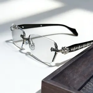 Frameless glasses with blue light blocking, HD clear lenses and sparkling diamond-cut edges, fashion metal temples for women and men, computer gaming readers, daily street style eyewear.