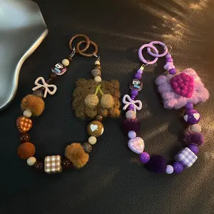 Autumn and Winter New Warm Brown Hairball Phone Chain Weaving Fruit Phone Hanging Rope Hanging Wrist Chain Anti Loss Pendant for Women Phone Charms