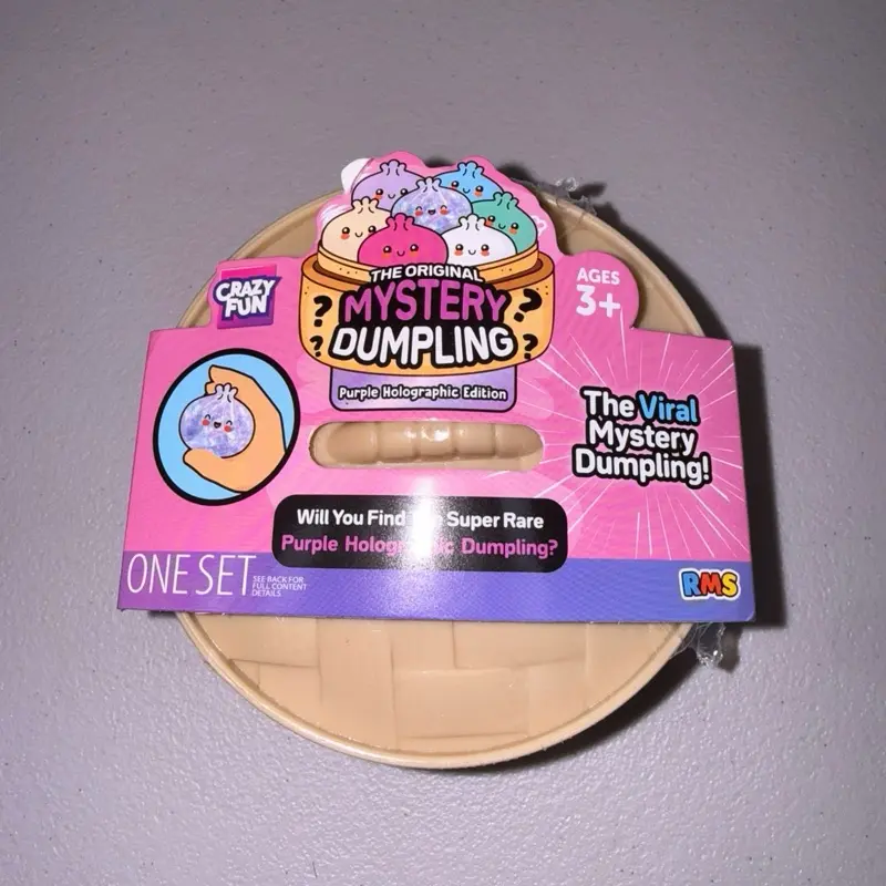 Crazy Fun RMS USA The Original Mystery Dumpling Purple Holographic Edition Squishy Toy Blind Pack Ages 3+ 9254124