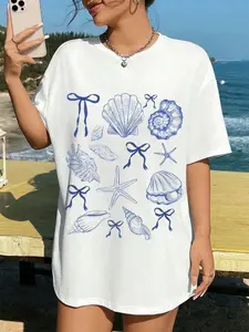 Plus Size - Plus Size - Chic White Oversized featuring Blue Seashell Starfish and Bow Line Art - Perfect for Casual Summer Days by the Beach Ideal for Outdoor Selfies and Relaxed Outings Stylish and Comfortable