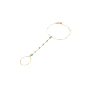 Ettika Dripping Crystal Hand Chain in Turquoise & Gold