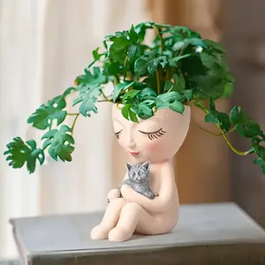 1 white sitting girl holding a cat resin vase, creative succulent plants potted outdoor gardening decoration.