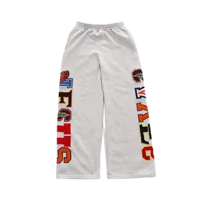 'JESUS SAVES' COLLEGE SWEATPANTS