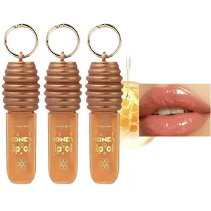 Honey Lip Oil – Professional makeup product with keychain for easy carrying and a quick-drying formula. Color: moisturizing jelly texture that hydrates and smooths lips.