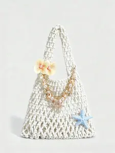 Fresh artistic style casual versatile woven shoulder bag, Casual Commuter Bag, embellished with flowers, shells, pearls, and chains, woven long shoulder strap, beige background, suitable for commuting/vacation dressing scenes, Fashionable Bags