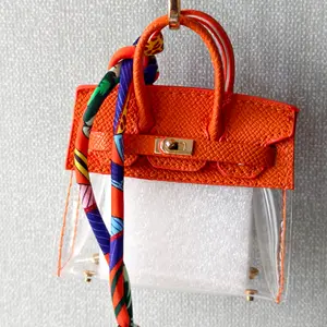 Birk-Birg Dog Waste Bag Dispenser Orange Lychee Textured Pleather and Clear Compact 3x1.5x2.5in Stylish Practical for Walks Includes Decorative Spring Clip or Scarf