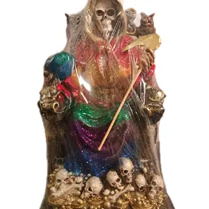 10.5 Santamuerte Statue with dragons on side of chair