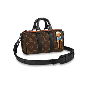 LOUIS VUITTON Keepall Nano Monogram Scarecrow Monkey Patch Coated Canvas and Leather Crossbody Handbag for Men in Brown