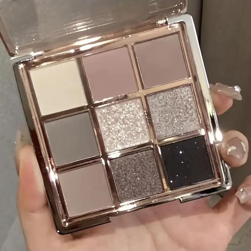 9-color eyeshadow palette - smoky gray, brown, and pink tones, featuring both matte and shimmer finishes. A versatile eyeshadow palette suitable for various makeup looks, an essential cosmetic, perfect as a Christmas gift.