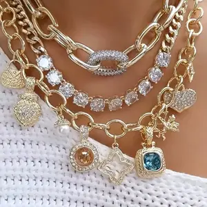 Shop The Look - 14k Gold Plated Necklaces Multicharm Necklace, Oval Link Magnetic Closure Necklace and CZ Cluster Cuban Link Necklace